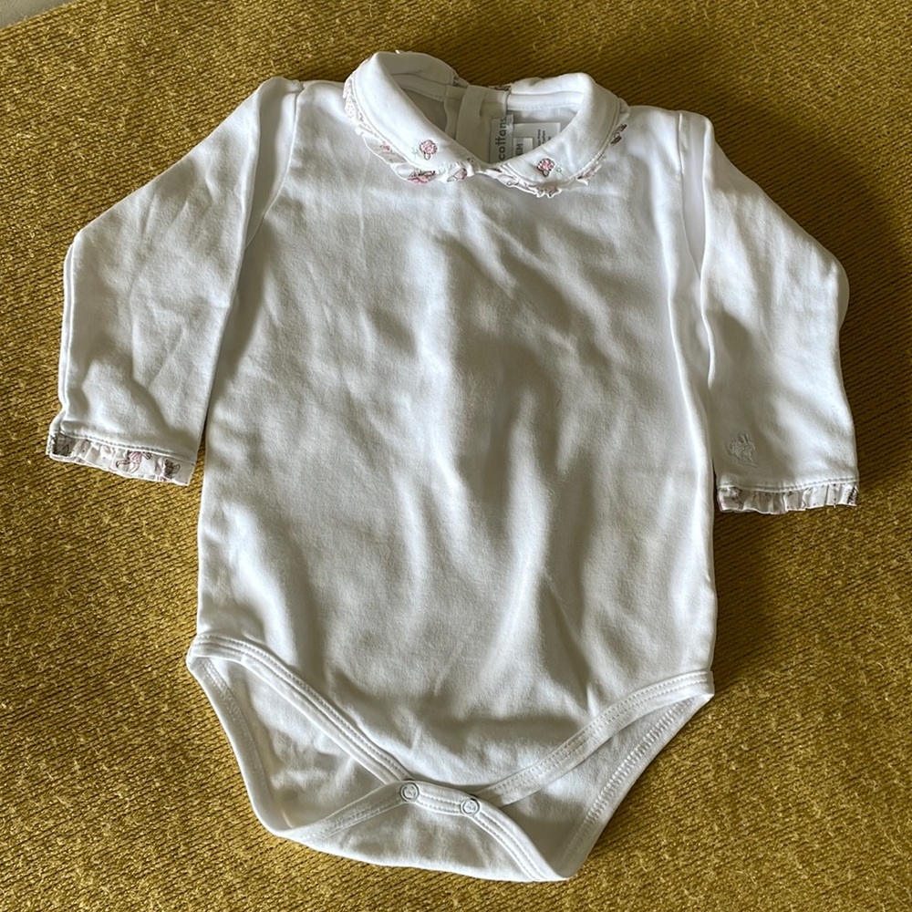 Baby cotton white baby girl onesie.
